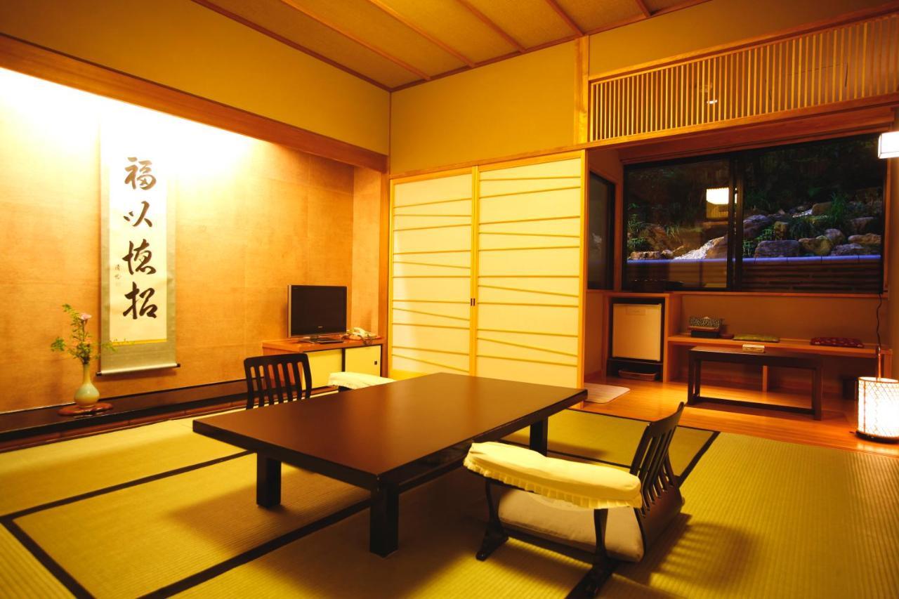 Kyoto Arashiyama Onsen Ryokan Togetsutei Bagian luar foto