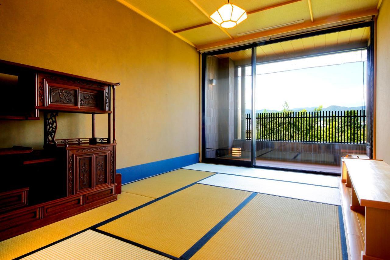 Kyoto Arashiyama Onsen Ryokan Togetsutei Bagian luar foto