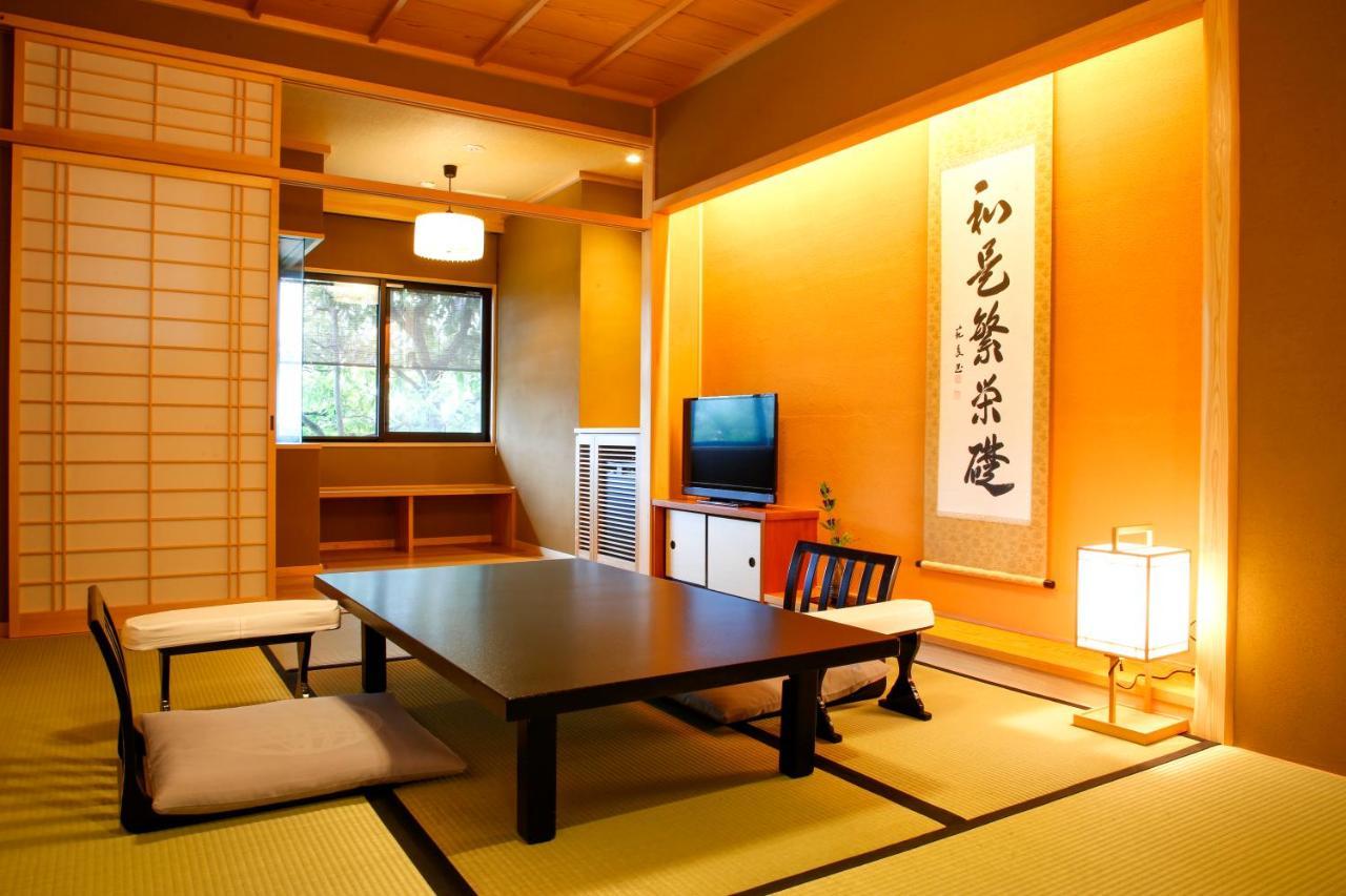 Kyoto Arashiyama Onsen Ryokan Togetsutei Bagian luar foto